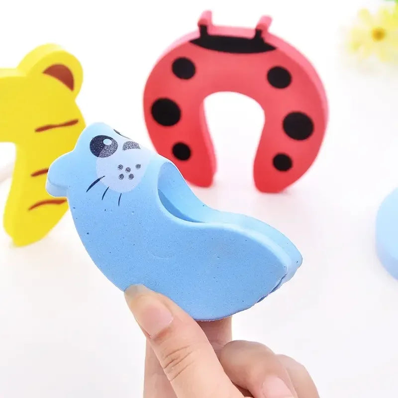 Baby Safety Door Stoppers – Anti-Pinch Foam Guards with Cute Animal Design (2/5 pcs) - Nestling Babies 